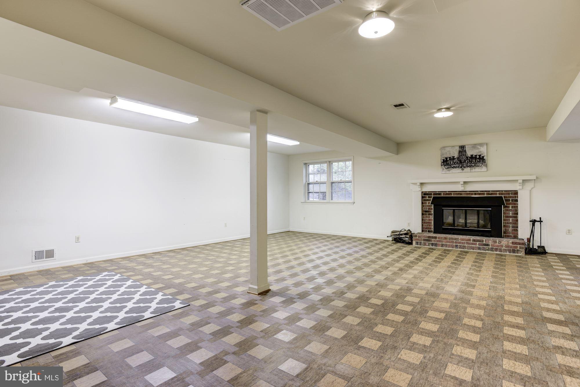 10715 Midsummer Drive Reston, VA 20191 - Photo 16 of 43 Space for Media Room, Play Room, Pool Table & More