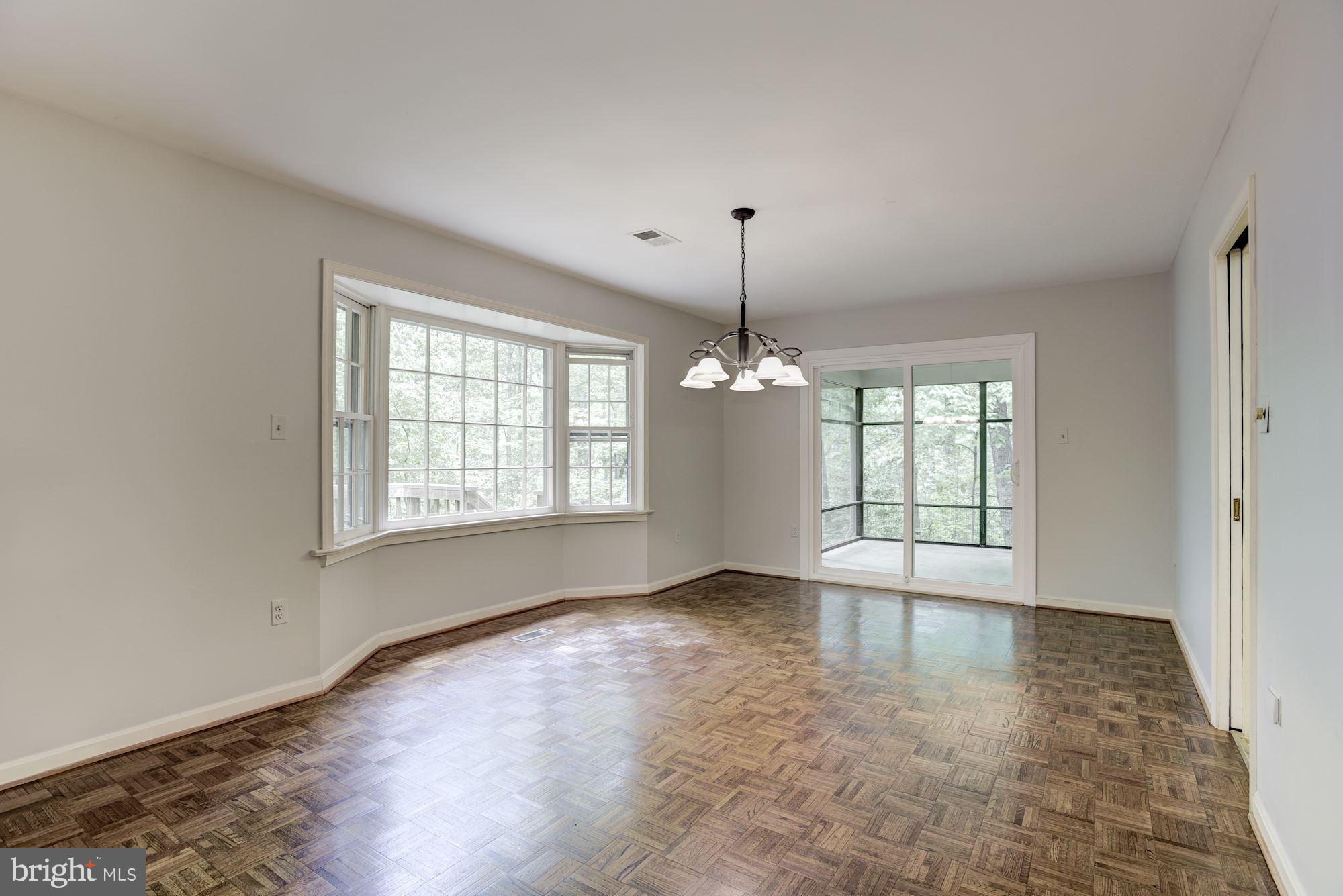 10715 Midsummer Drive Reston, VA 20191 - Photo 5 of 43 Dining Room w/ Bay Window Opens to Screened Porch