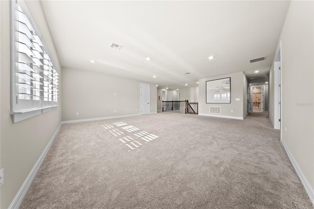 7905 Wandering Way Orlando, FL 32836 - Photo 36 of 70 a view of livingroom with natural light
