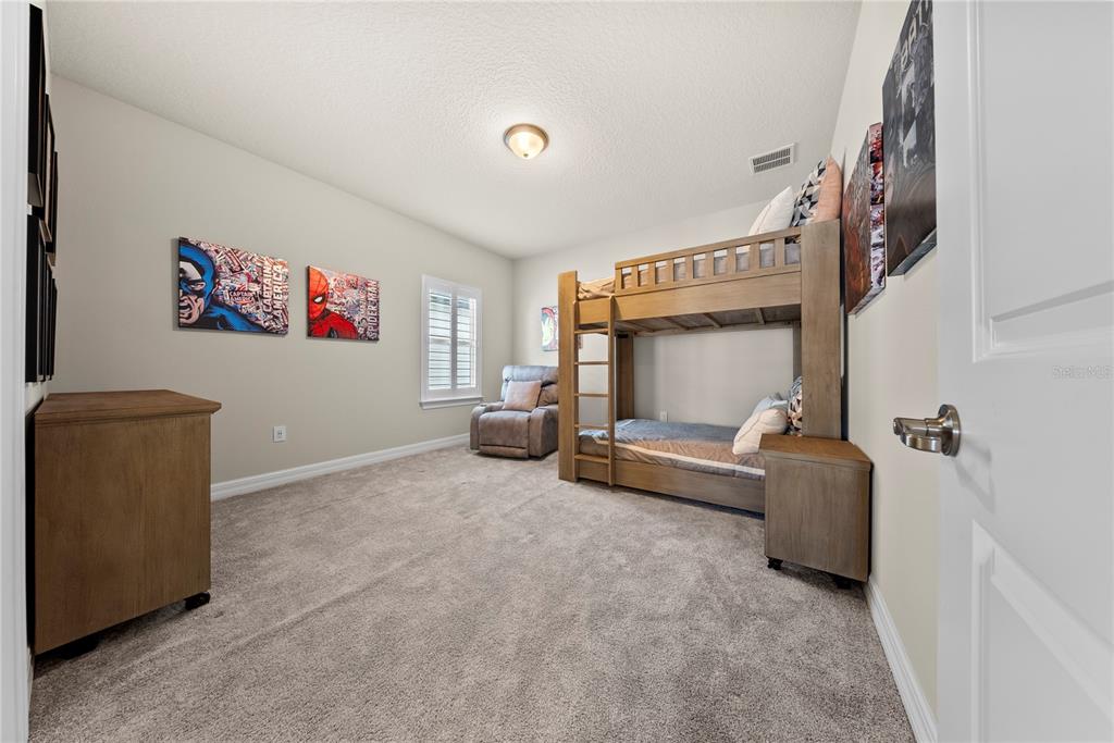 7905 Wandering Way Orlando, FL 32836 - Photo 48 of 70 a living room with furniture and a couch