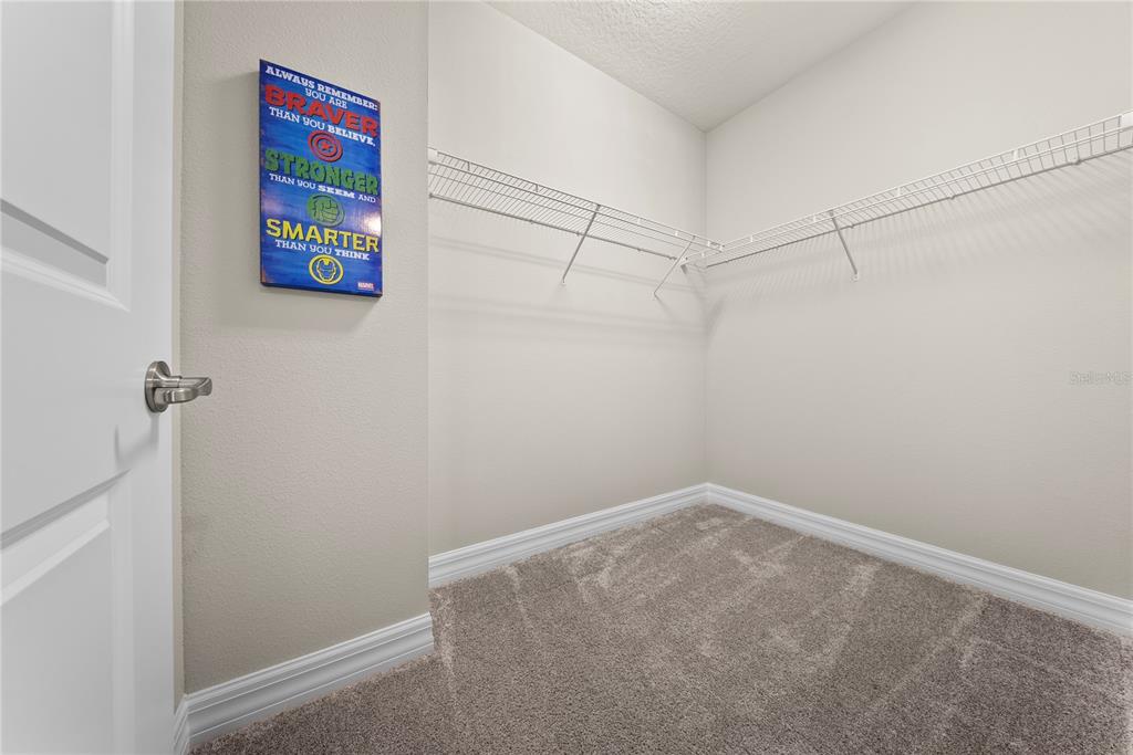 7905 Wandering Way Orlando, FL 32836 - Photo 50 of 70 a view of a room with racks on the wall