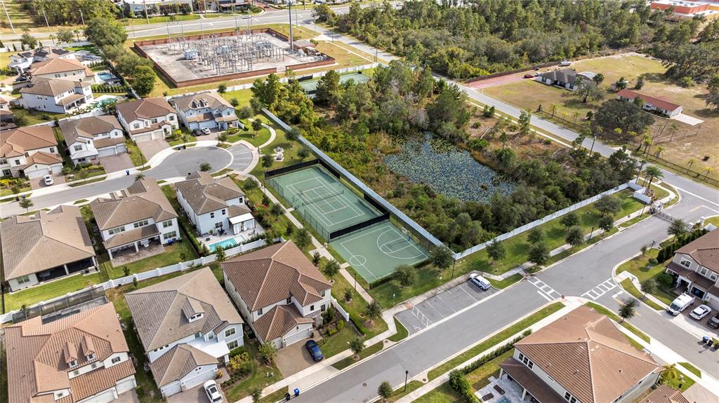 7905 Wandering Way Orlando, FL 32836 - Photo 64 of 70 an aerial view of a residential apartment building with a yard