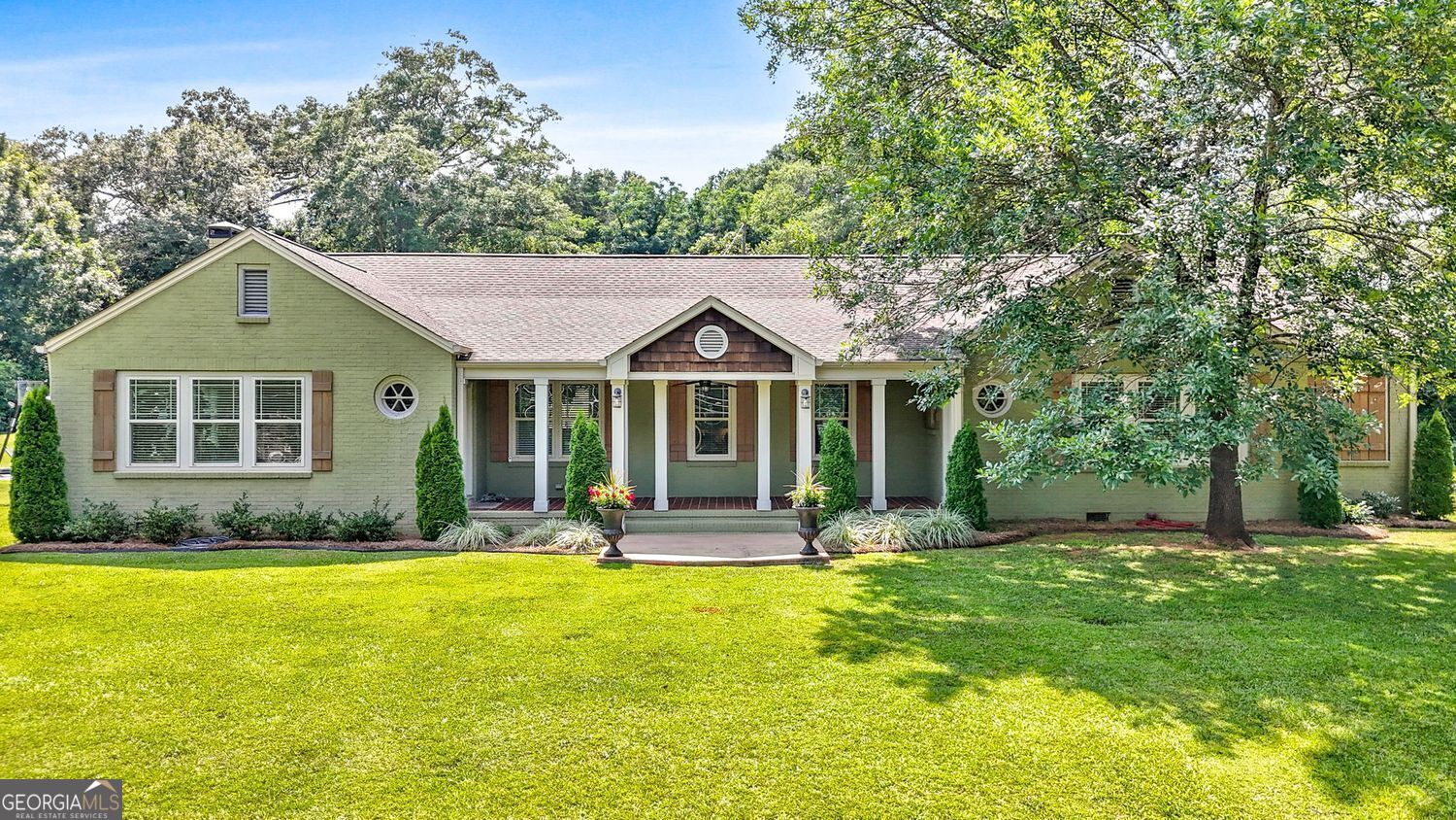 720 South Church Street Thomaston, GA 30286 - Photo 1 of 1 a front view of house with yard and green space