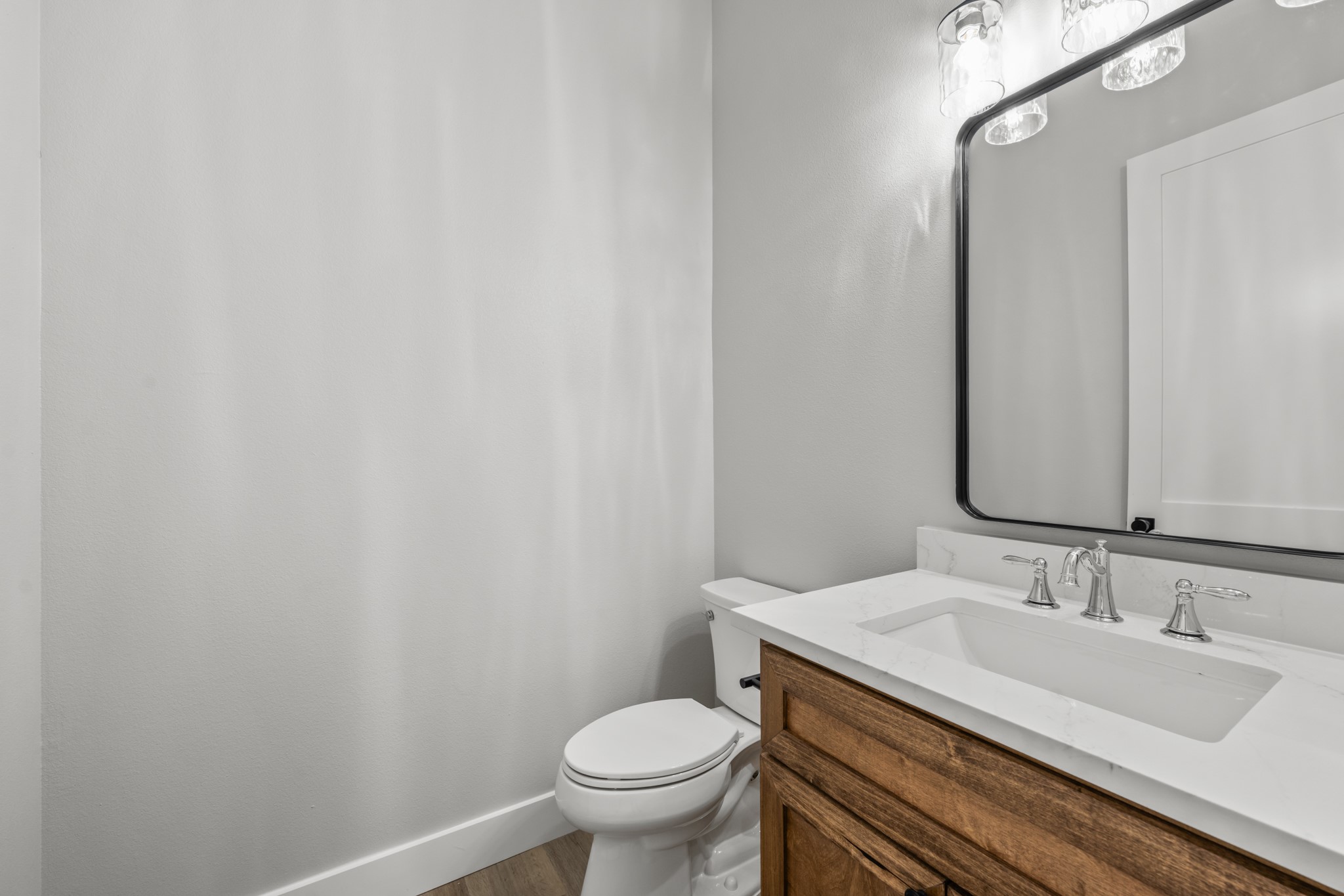 95 Longhorn Loop New Waverly, TX 77358 - Photo 33 of 50 a bathroom with a sink and a toilet