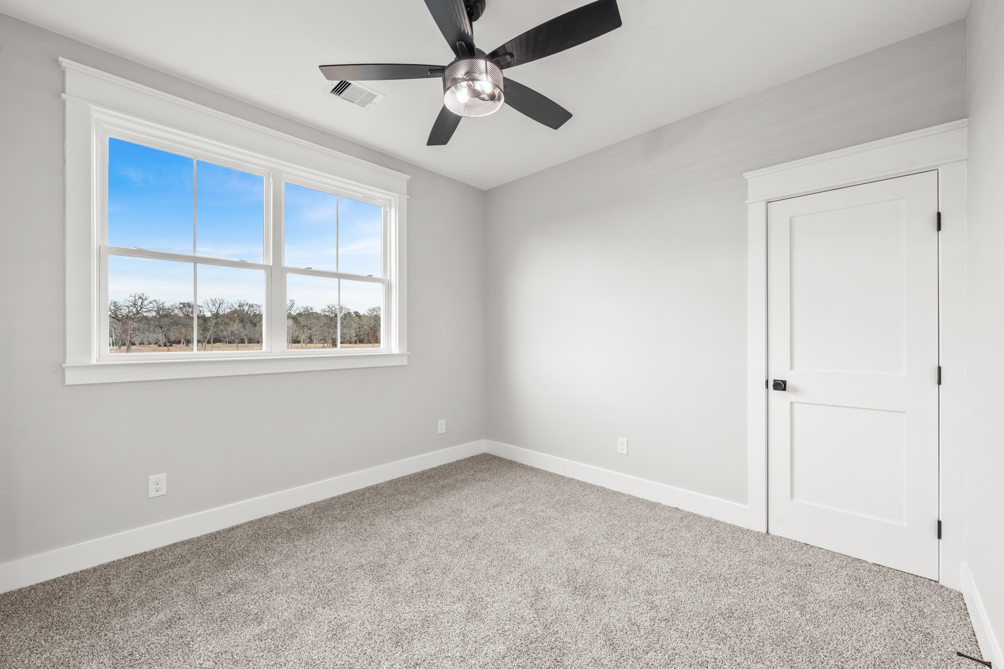 95 Longhorn Loop New Waverly, TX 77358 - Photo 36 of 50 a view of an empty room with a window