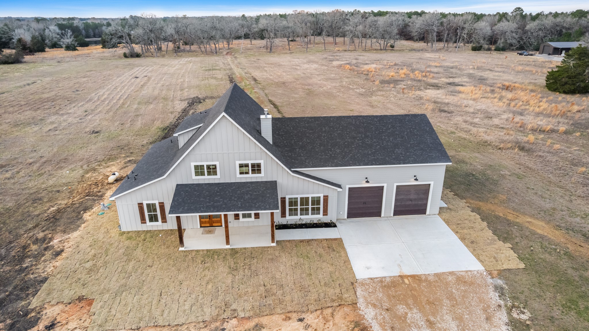 95 Longhorn Loop New Waverly, TX 77358 - Photo 4 of 50 an aerial view of a house with a yard