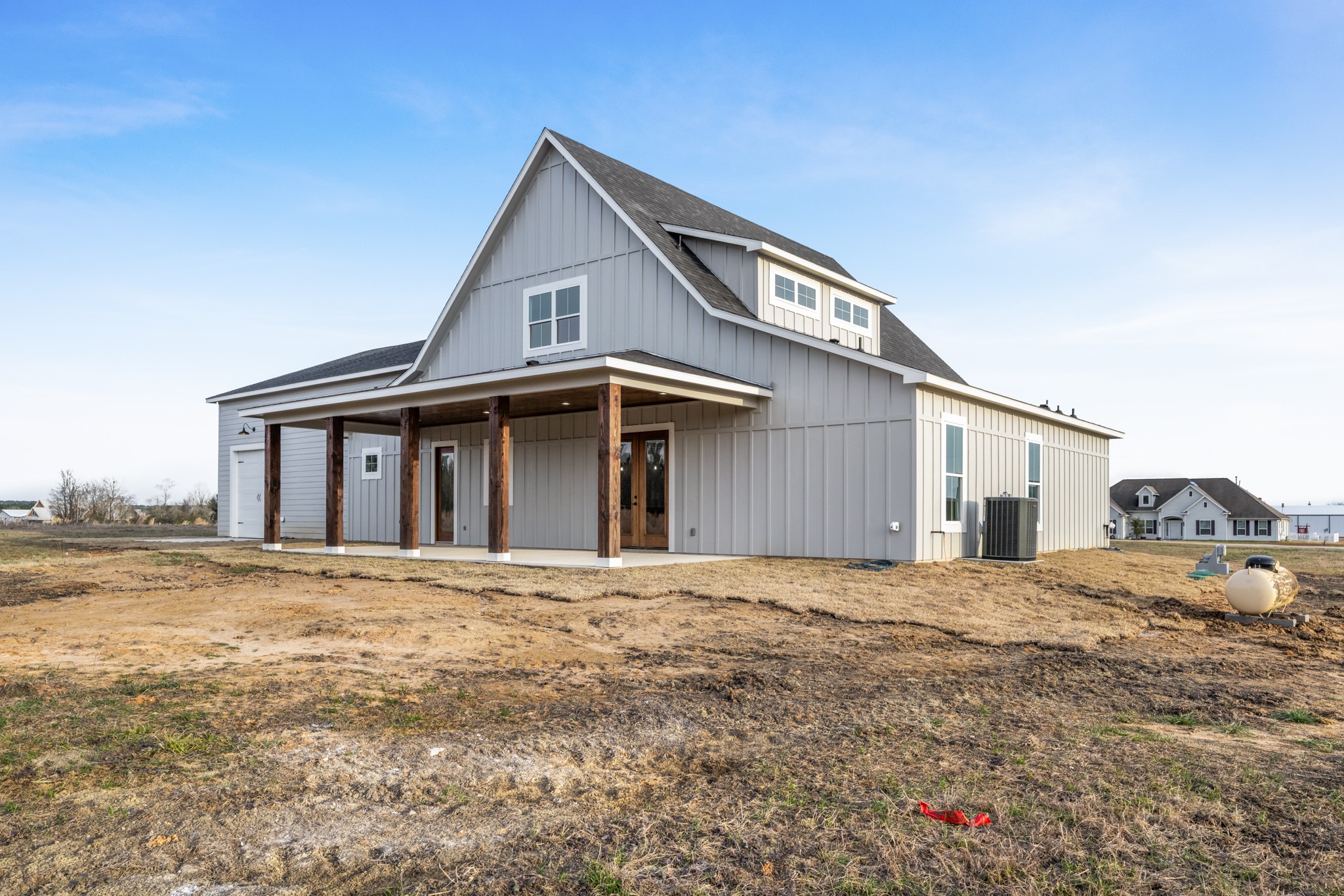 95 Longhorn Loop New Waverly, TX 77358 - Photo 44 of 50 a front view of a house with a yard