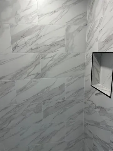 a sink sitting next to a window