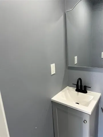 a kitchen with a sink and a window