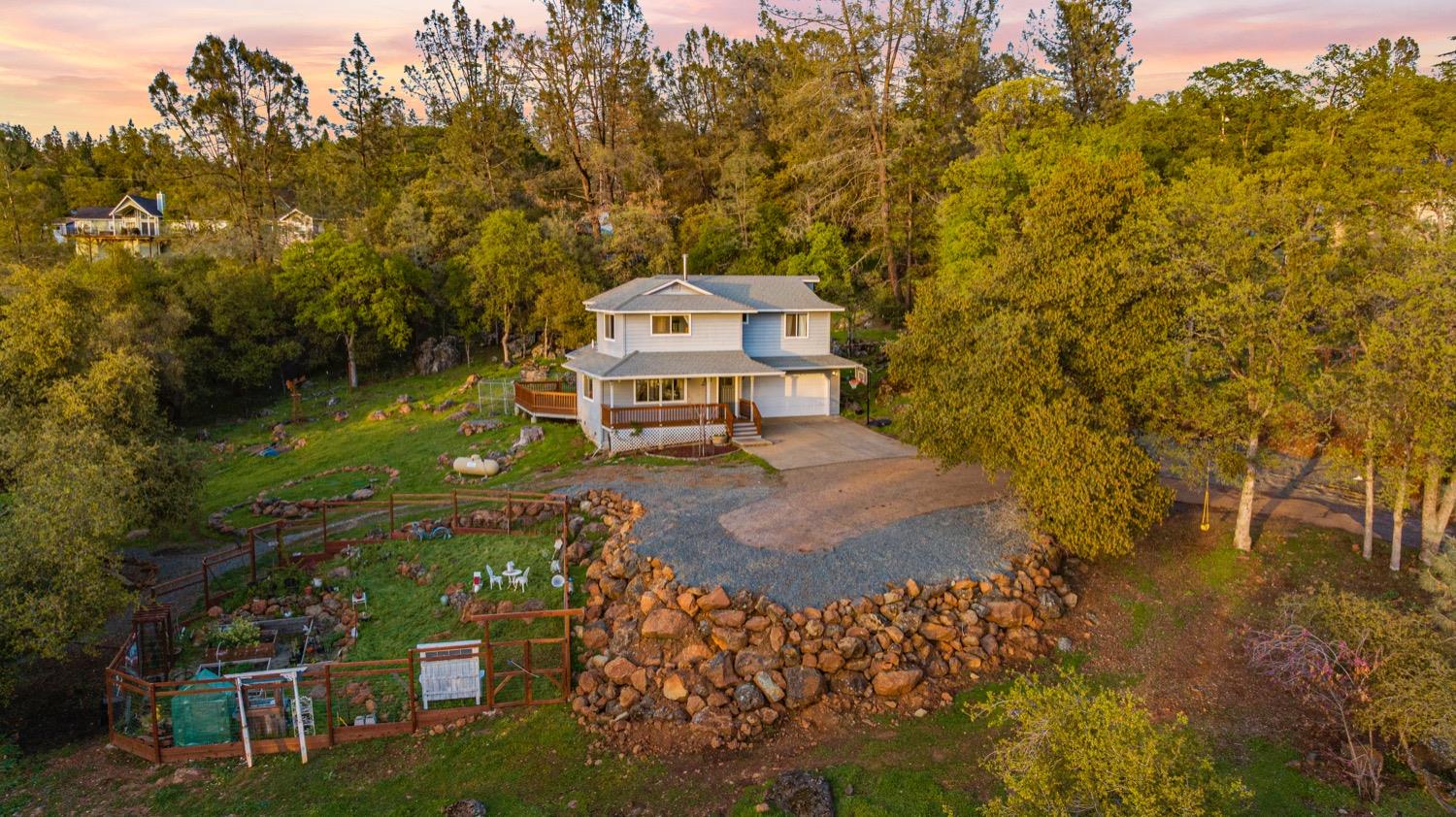 11080 East Lime Kiln Road Grass Valley, CA 95949 - Photo 1 of 1 a small pool with a yard and trees