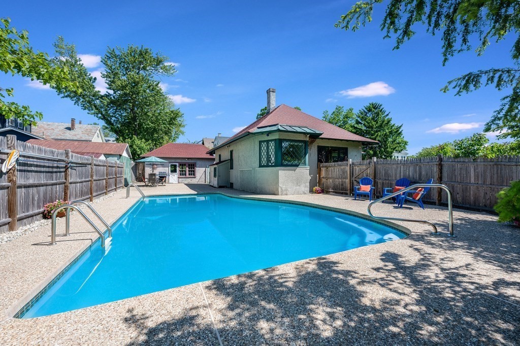 55 Paul Street Watertown, MA 02472 - Photo 37 of 42 a view of a house with swimming pool and sitting area