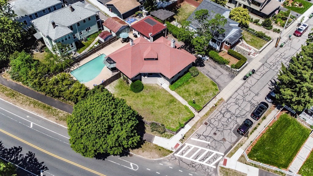 55 Paul Street Watertown, MA 02472 - Photo 41 of 42 an aerial view of a house with garden space and street view
