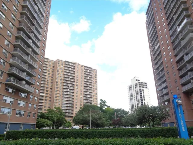 a view of a city with tall buildings