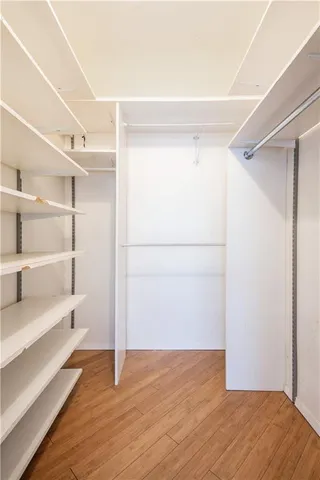 a view of an empty walk in closet