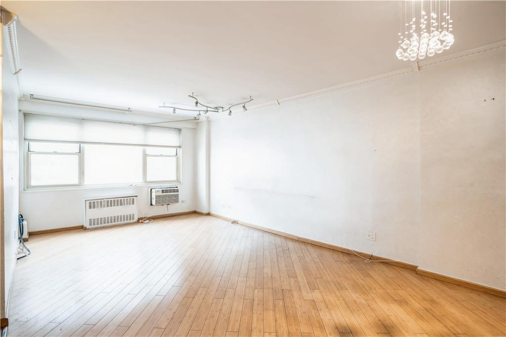 2944 West 5th Street, Unit 14F Brooklyn, NY 11224 - Photo 5 of 13 a view of an empty room with a window