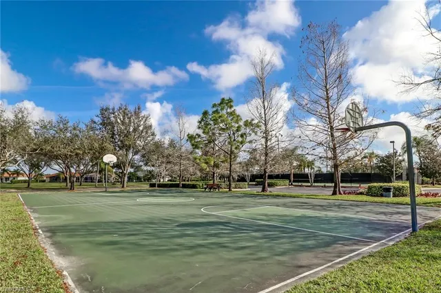 a building with trees in the background