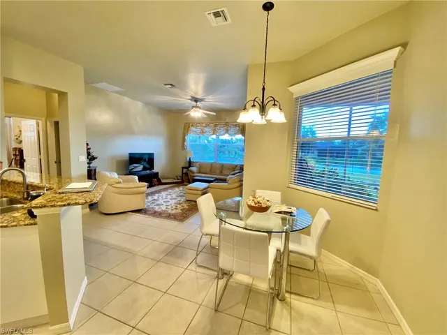 a view of a dining room and livingroom