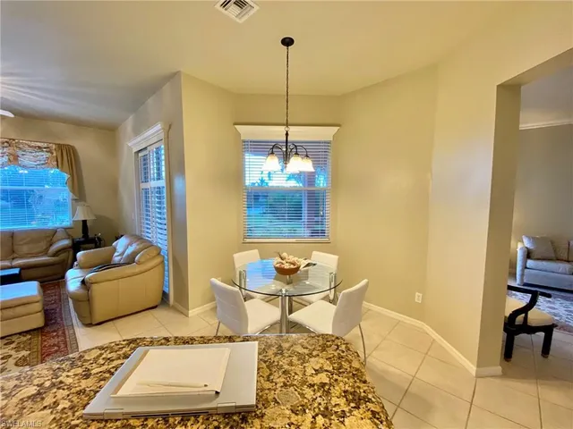 a living room with a couch and a table