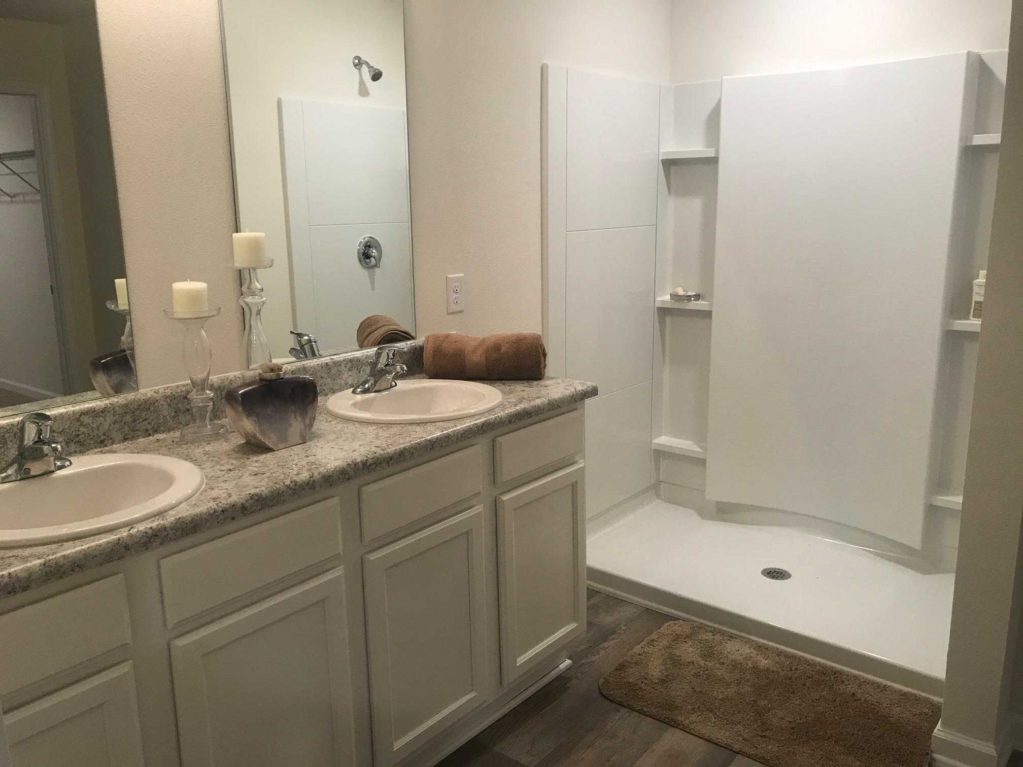 3501 Sugar Maple Lane Crestview, FL 32539 - Photo 11 of 28 a bathroom with a sink a toilet and shower
