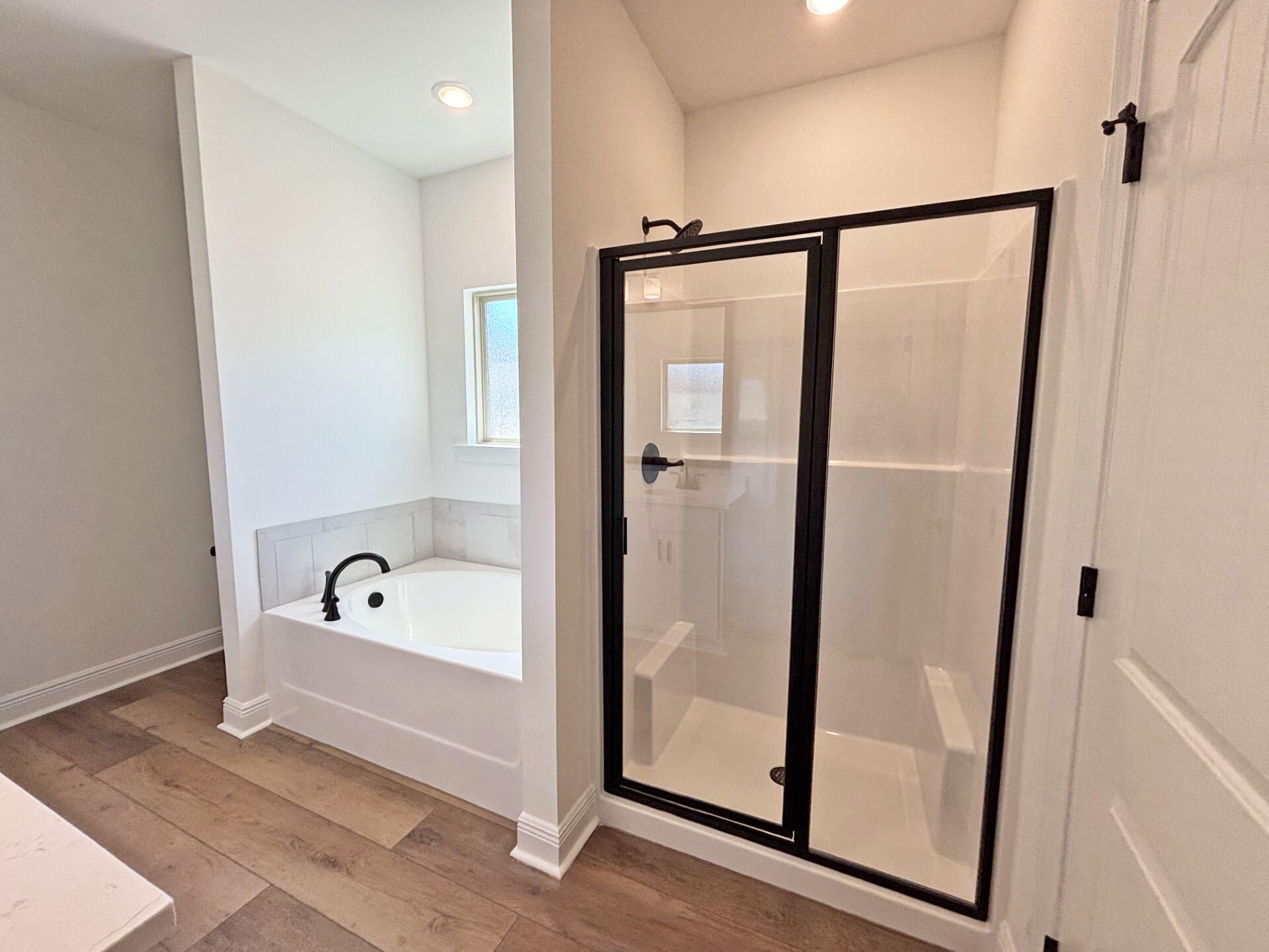 2731 Louis Circle Crestview, FL 32536 - Photo 11 of 17 a bathroom with a tub a mirror and a shower