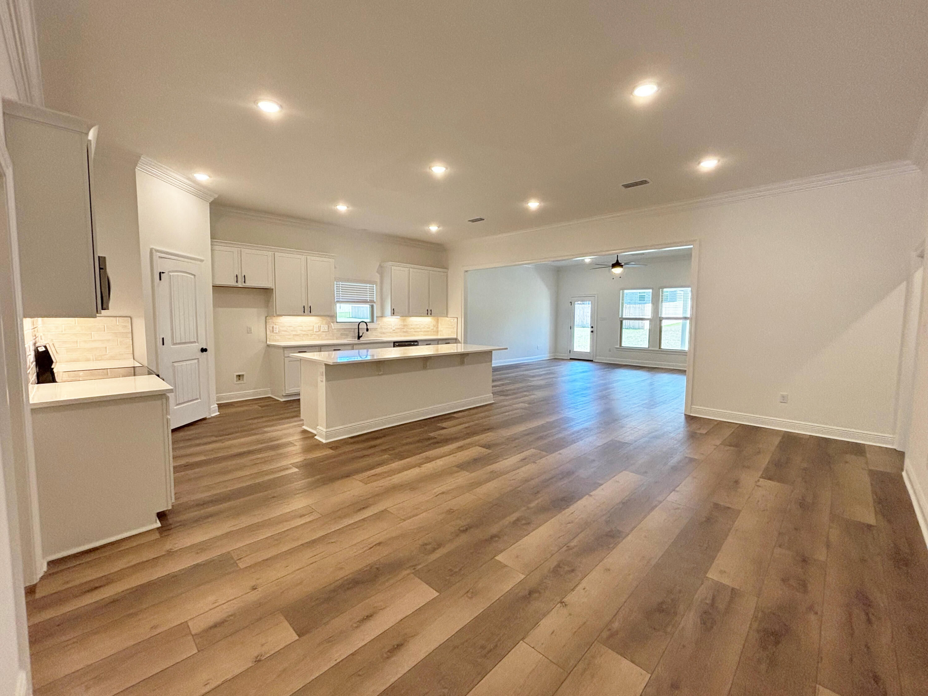 2731 Louis Circle Crestview, FL 32536 - Photo 6 of 17 a view of kitchen and wooden floor