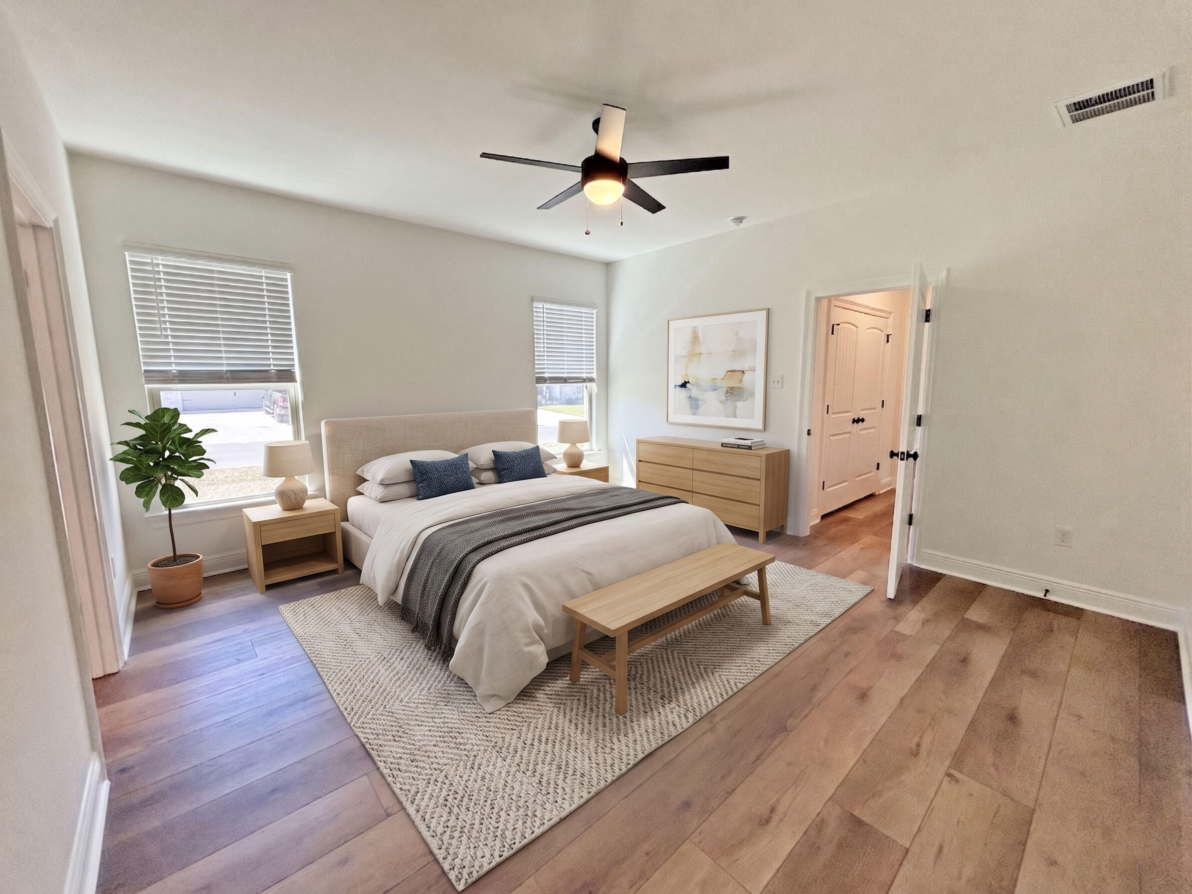 2731 Louis Circle Crestview, FL 32536 - Photo 8 of 17 a bedroom with a bed and wooden floor