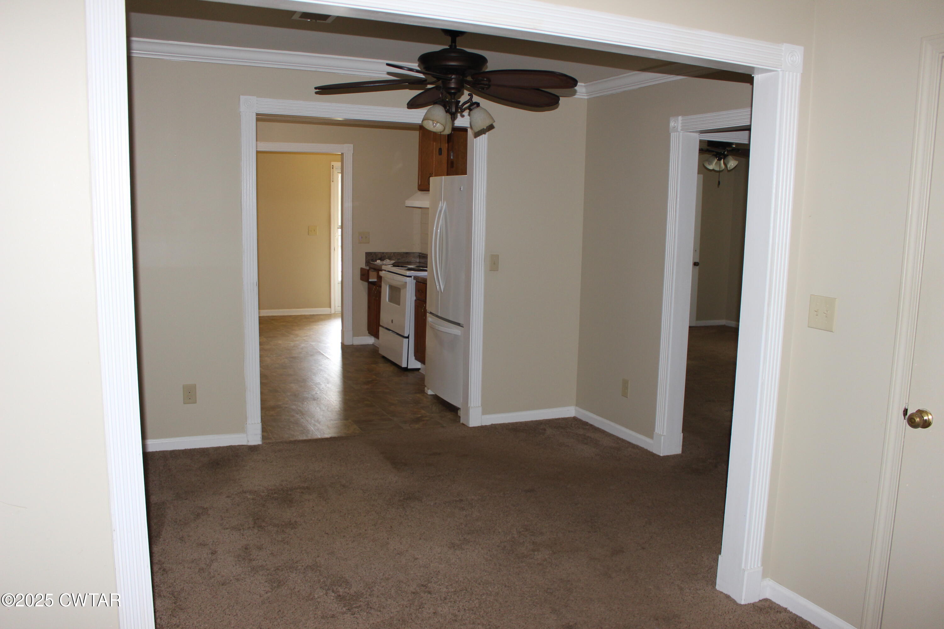 8860 Highway 138 Mercer, TN 38392 - Photo 13 of 23 a view of a hallway to a room