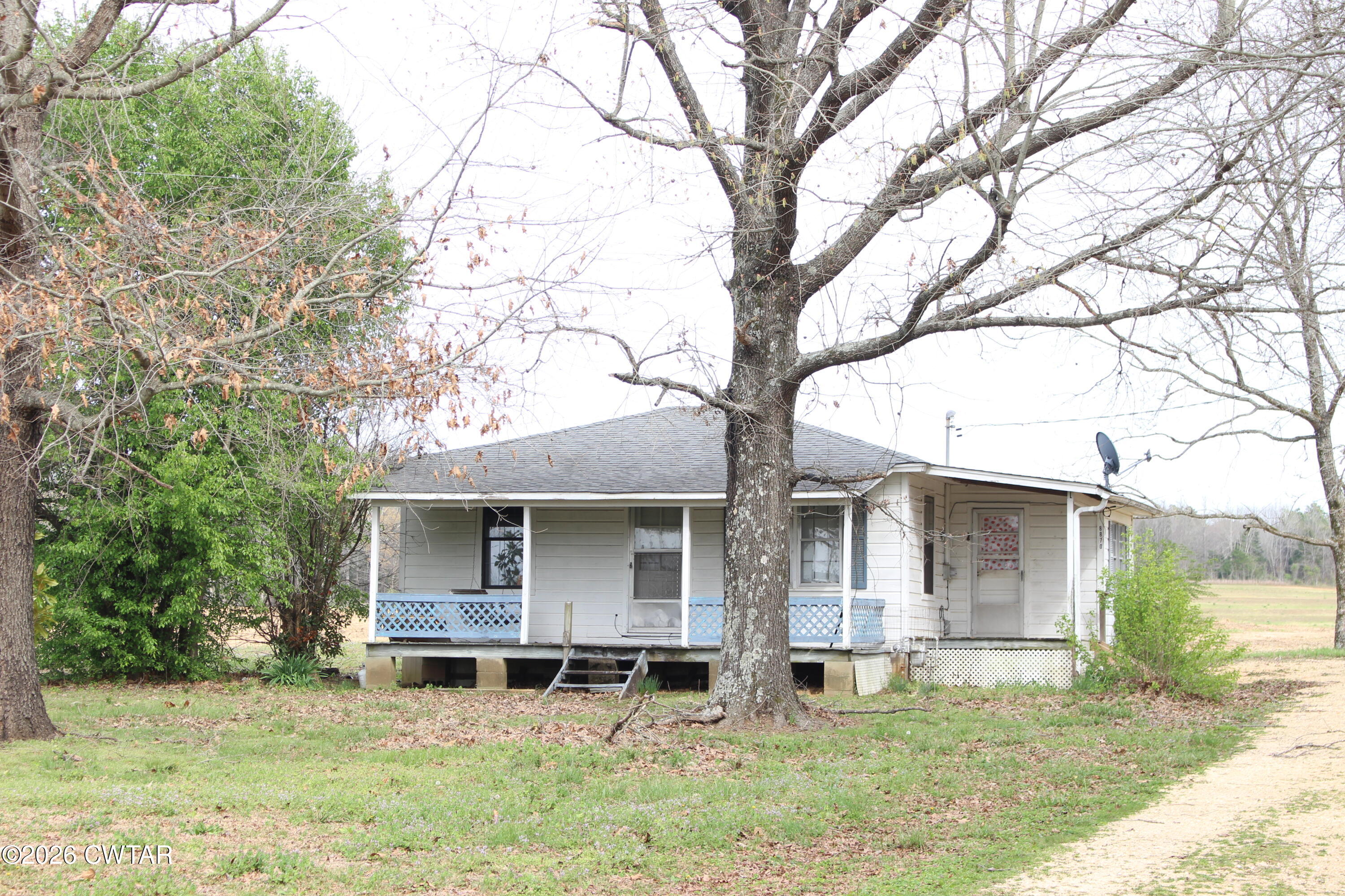 8860 Highway 138 Mercer, TN 38392 - Photo 22 of 23 front view of a house with a yard