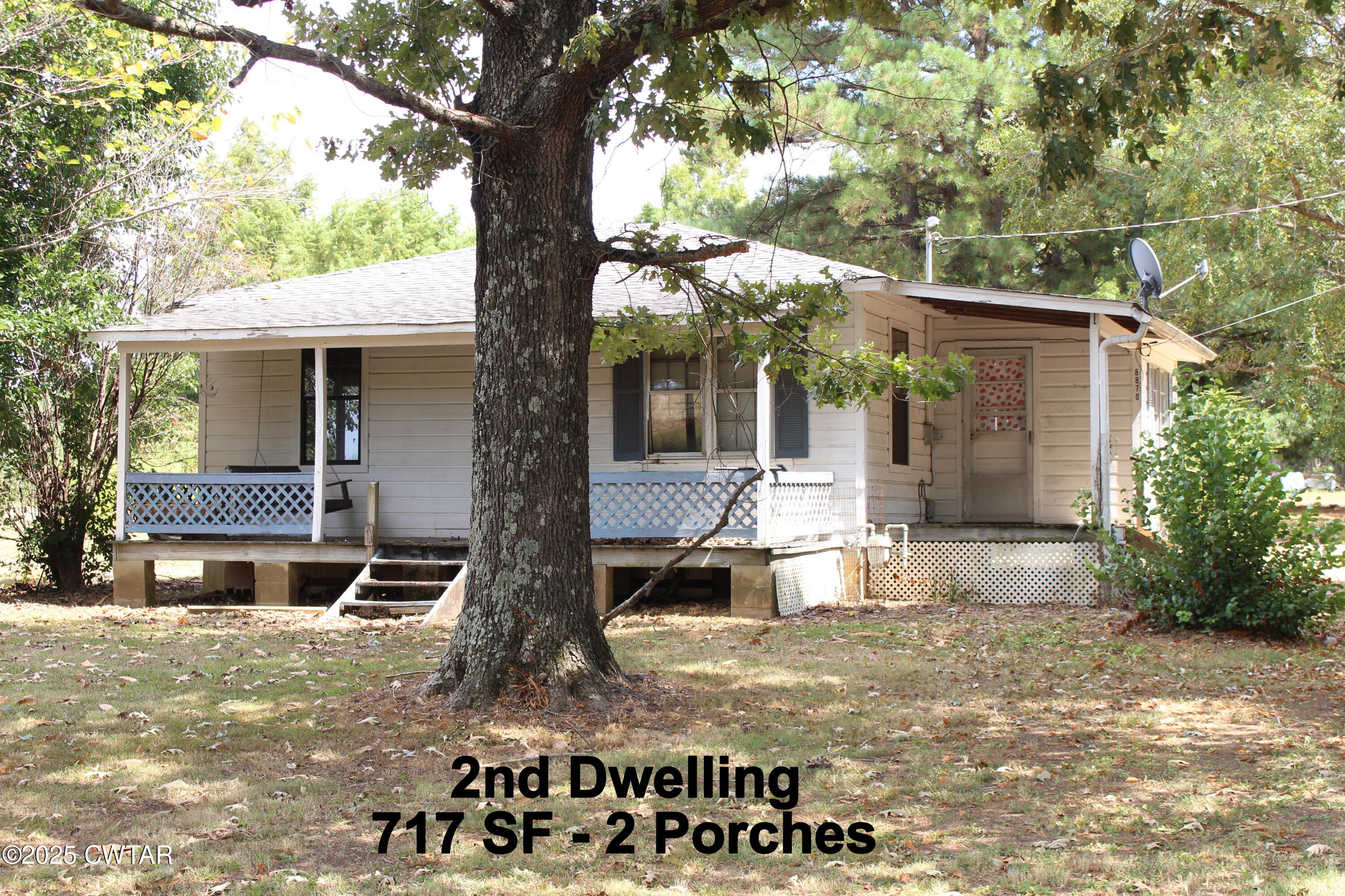 8860 Highway 138 Mercer, TN 38392 - Photo 4 of 23 a front view of a house with garden