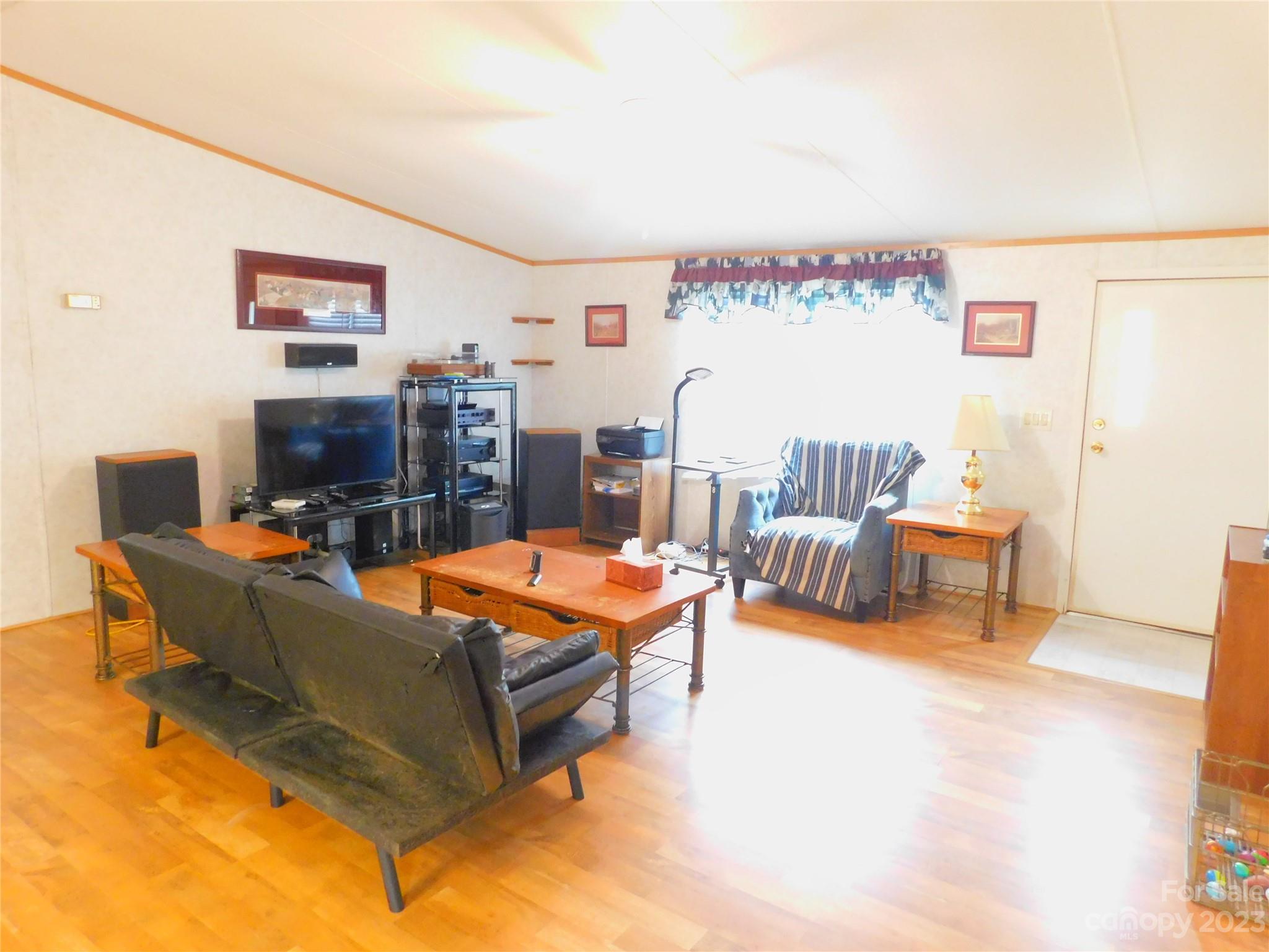 1642 Springlake Road York, SC 29745 - Photo 11 of 30 a living room with furniture and a table
