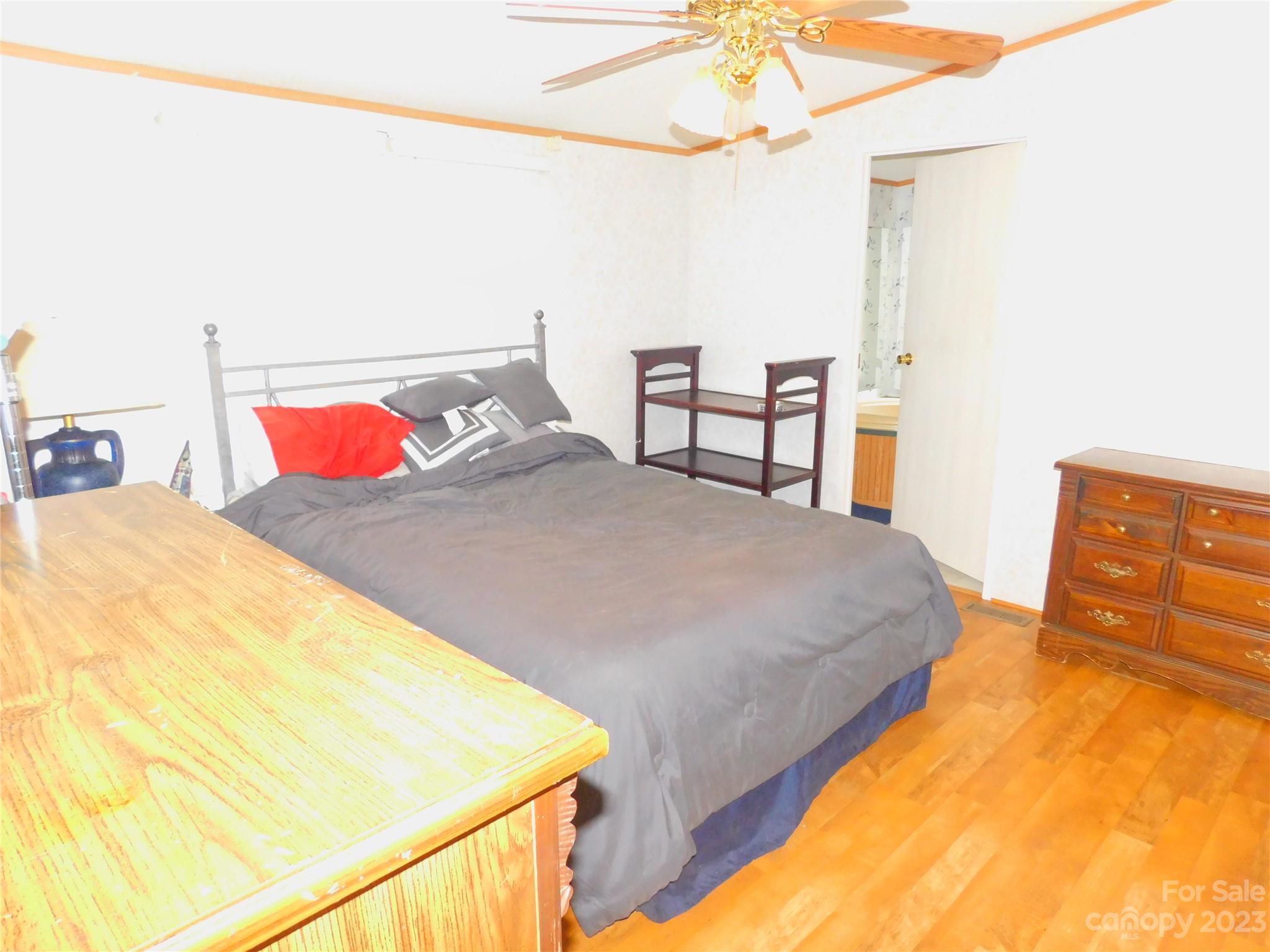 1642 Springlake Road York, SC 29745 - Photo 14 of 30 a bedroom with a bed and a dresser