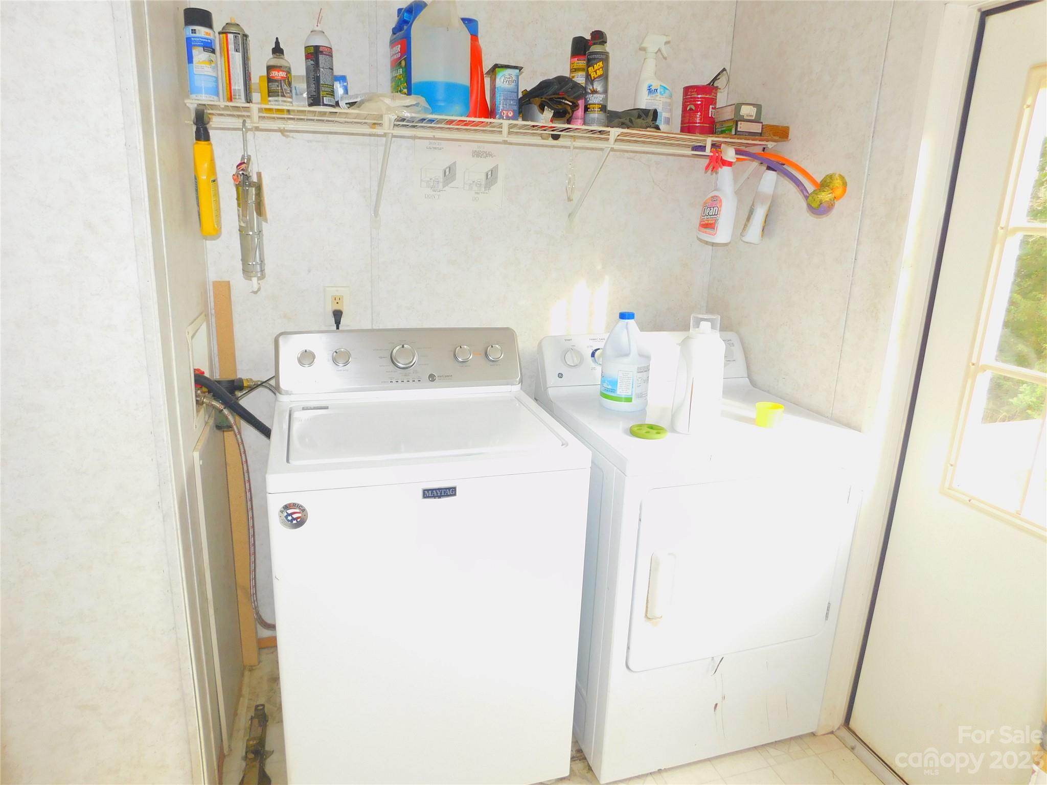 1642 Springlake Road York, SC 29745 - Photo 30 of 30 a utility room with a sink washer and dryer