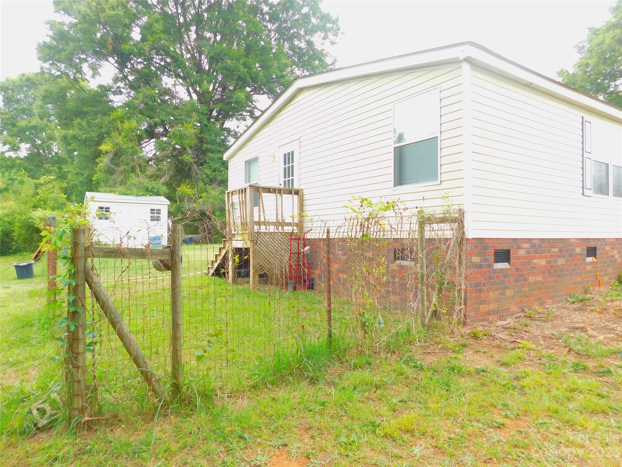 1642 Springlake Road York, SC 29745 - Photo 3 of 30 a house view with a backyard space