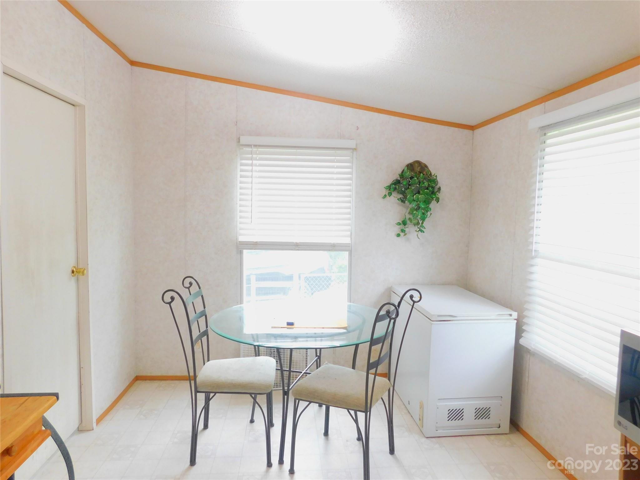 1642 Springlake Road York, SC 29745 - Photo 5 of 30 a view of a dining room with furniture and a window