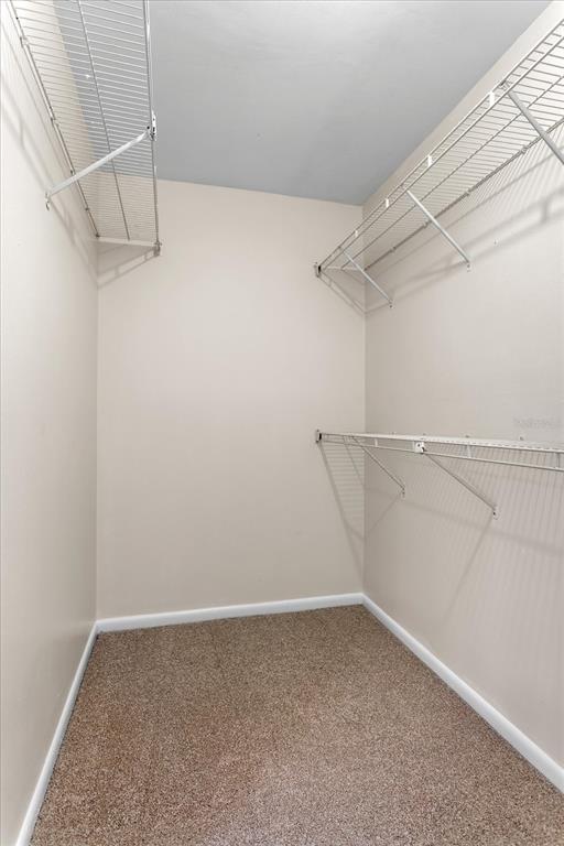 2786 Curry Ford Road, Unit 6B Orlando, FL 32806 - Photo 12 of 27 a view of a room with racks on the wall