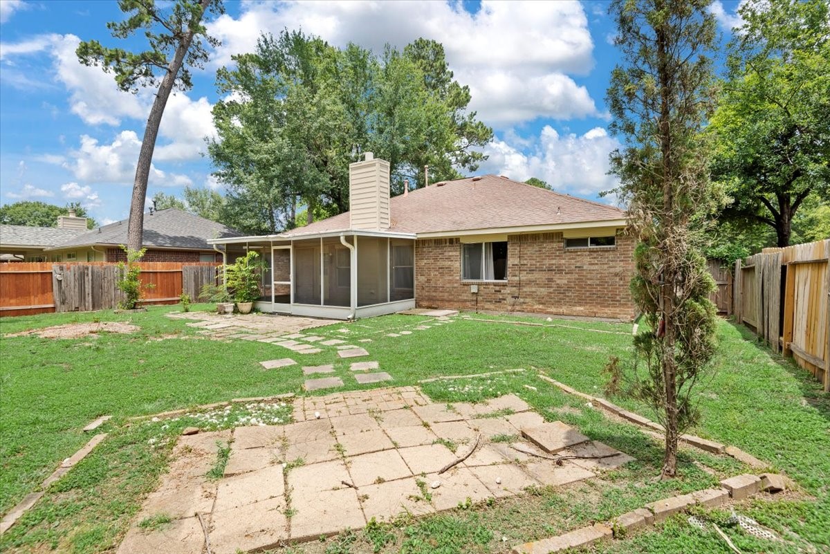 22711 Tree House Lane Spring, TX 77373 - Photo 26 of 28 a front view of a house with a yard