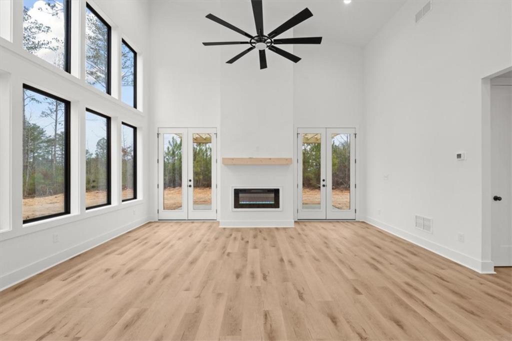 419 Lively Road Waco, GA 30182 - Photo 11 of 48 a view of a livingroom with a fireplace and window