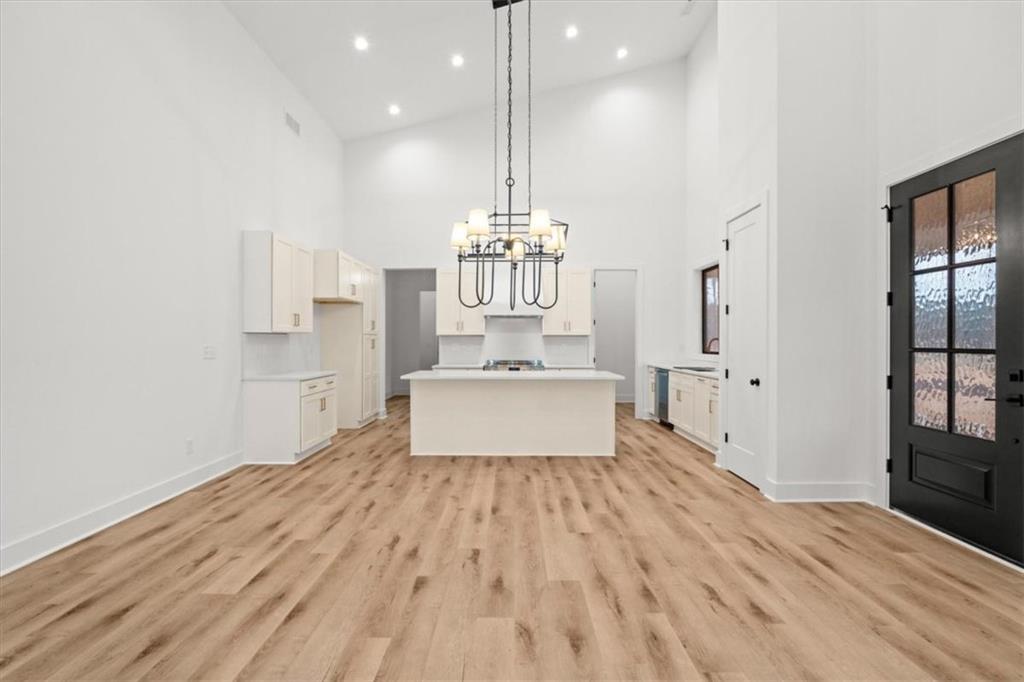 419 Lively Road Waco, GA 30182 - Photo 16 of 48 a view of a room with wooden floor and windows