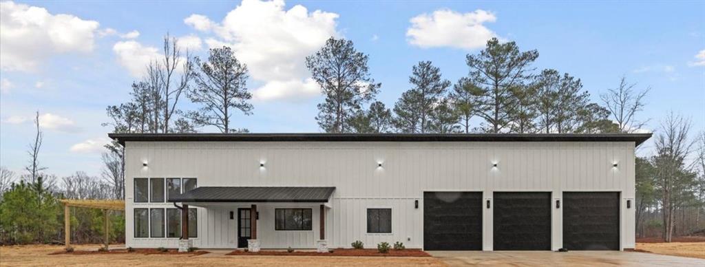 419 Lively Road Waco, GA 30182 - Photo 2 of 48 a front view of a house with garden