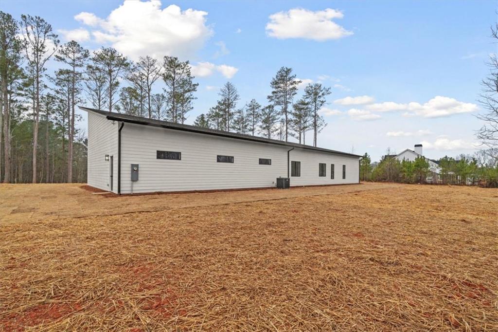 419 Lively Road Waco, GA 30182 - Photo 44 of 48 a house view with a backyard space