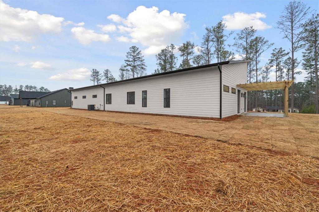 419 Lively Road Waco, GA 30182 - Photo 45 of 48 a view of a backyard of the house