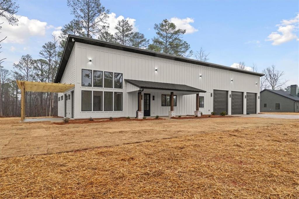419 Lively Road Waco, GA 30182 - Photo 6 of 48 a view of a house with a outdoor space