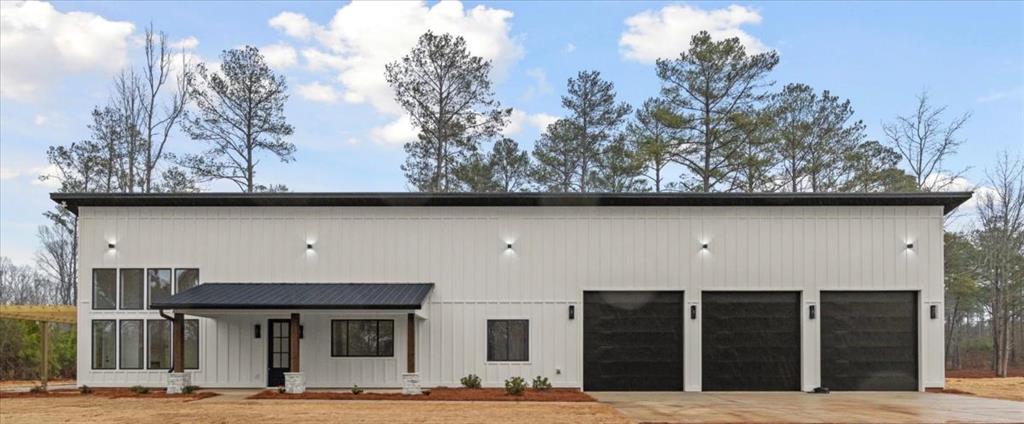 419 Lively Road Waco, GA 30182 - Photo 7 of 48 a view of a house with a outdoor space