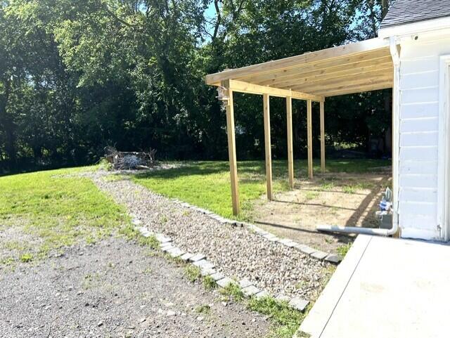 69225 Section Street Edwardsburg, MI 49112 - Photo 3 of 13 outside firepit