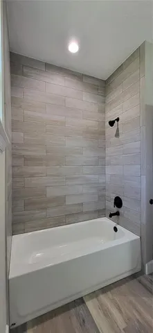 a bathroom with a bathtub