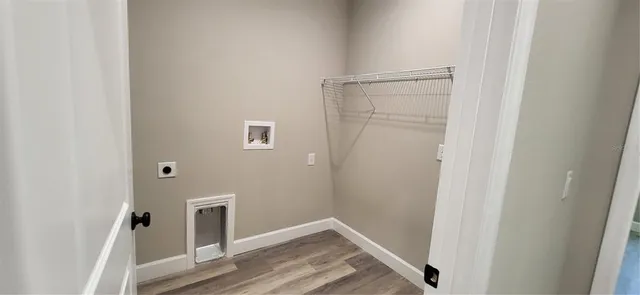 a view of small space with wooden floor