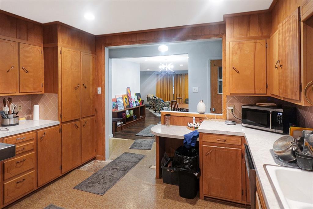 403 West Tarleton Street Stephenville, TX 76401 - Photo 7 of 19 a view of a kitchen with sink and cabinets