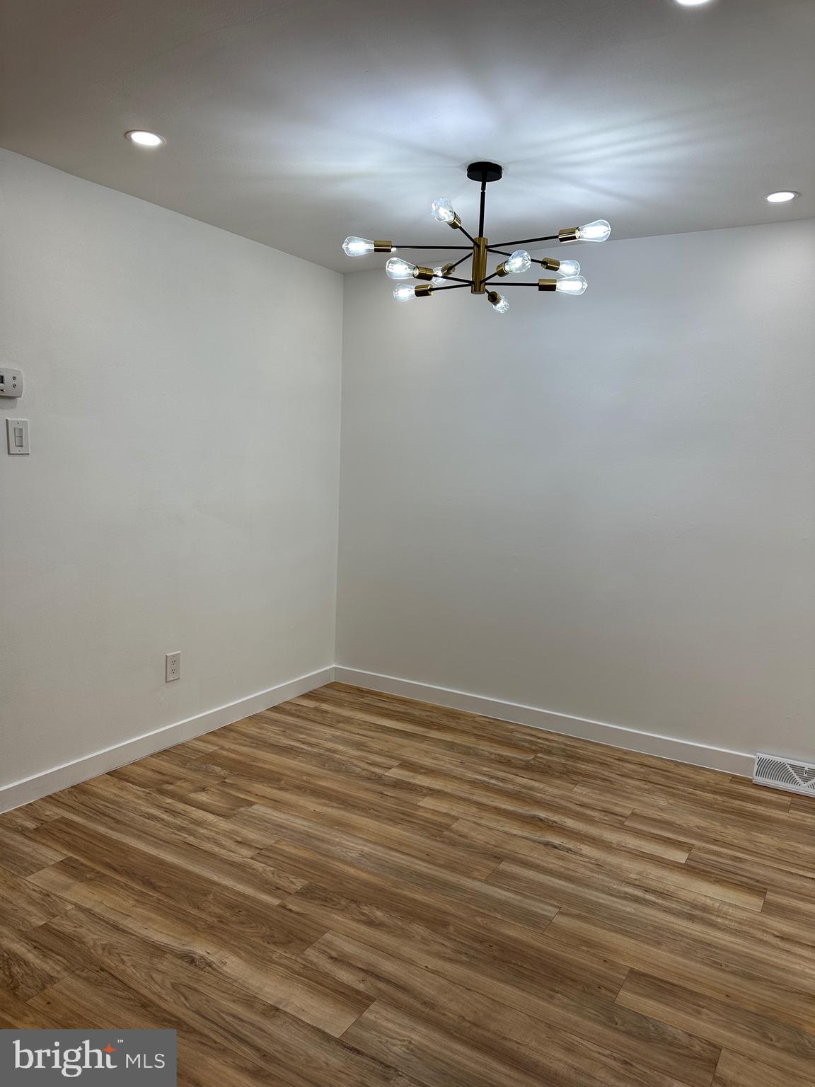 9405 Kirkwood Road Philadelphia, PA 19114 - Photo 11 of 66 a view of empty room with wooden floor
