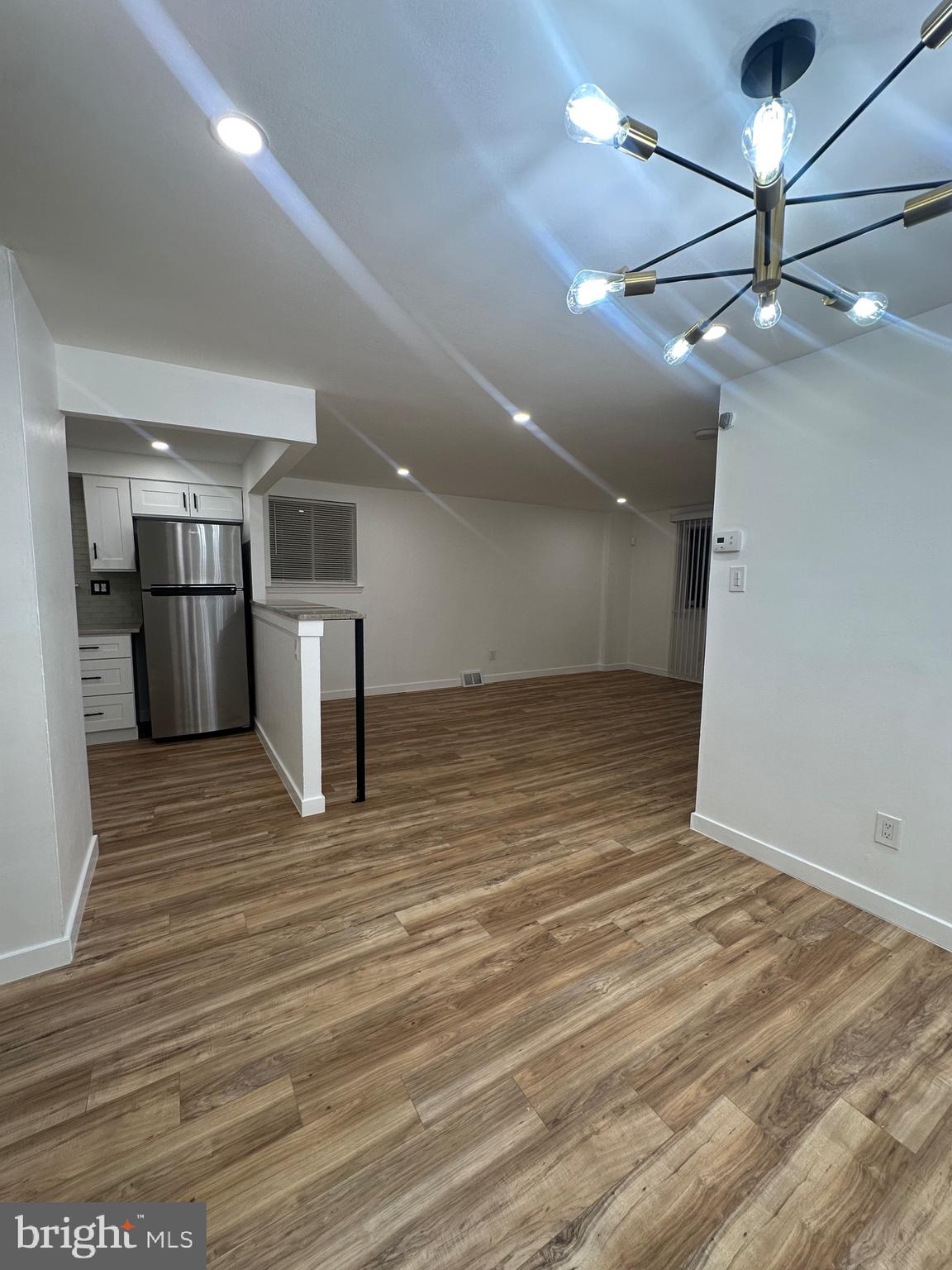 9405 Kirkwood Road Philadelphia, PA 19114 - Photo 12 of 66 a view of empty room with wooden floor
