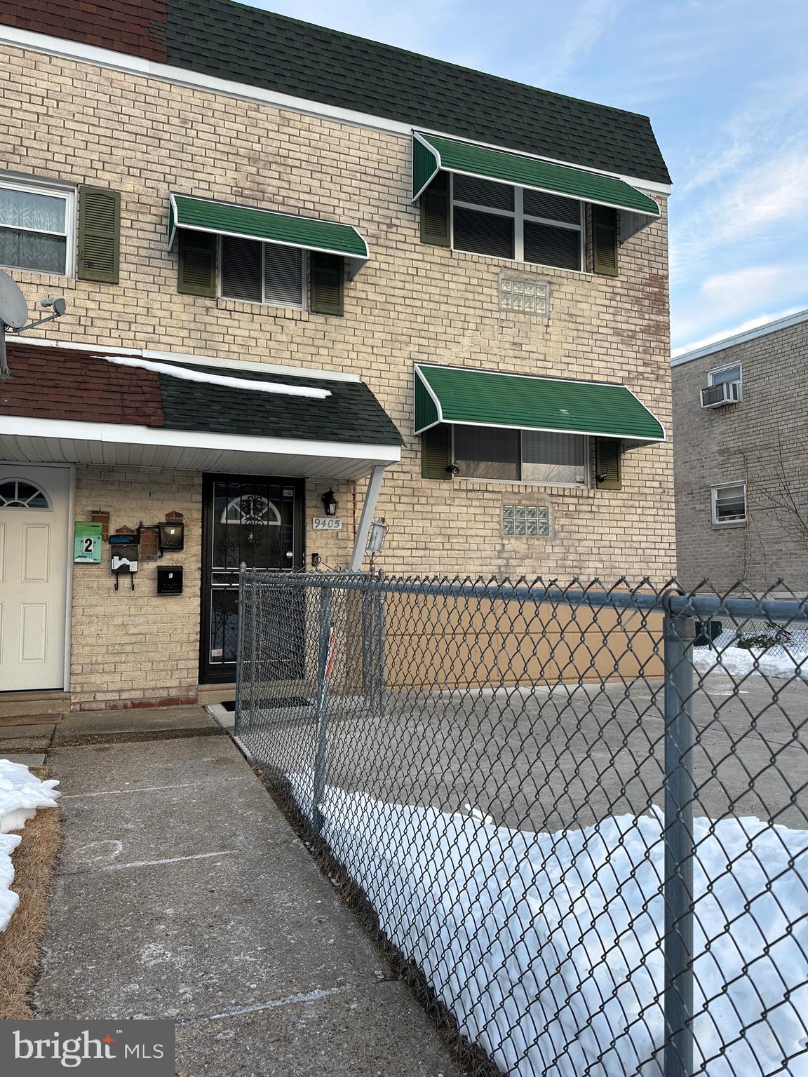 9405 Kirkwood Road Philadelphia, PA 19114 - Photo 2 of 66 a front view of a house with glass door